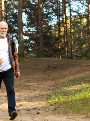health-activity-wellbeing-age-people-concept-self-determined-active-bearded-european-man-his-sixties-walking-fast-while-trekking-mountain-forest-having-confident-focused-look_343059-2615